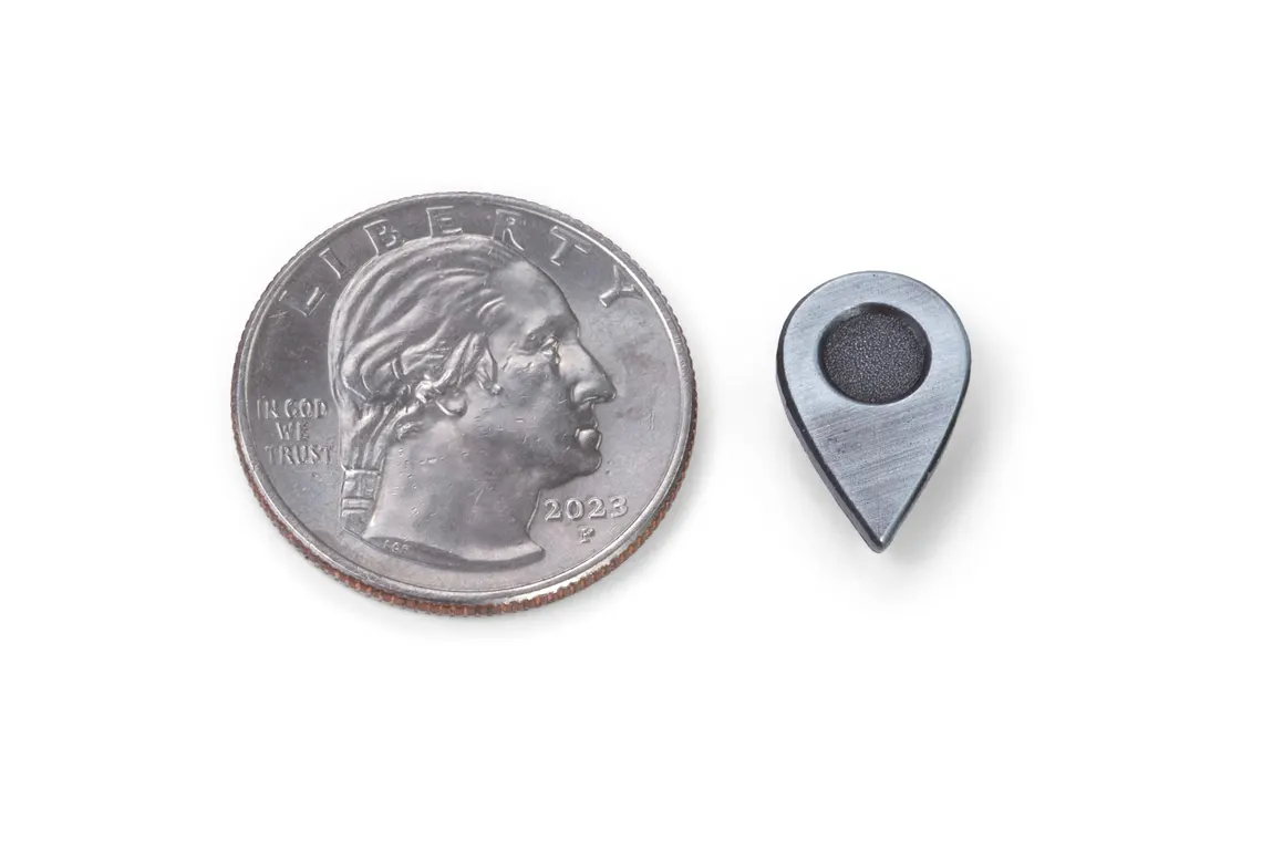 comparing search pin to coin for size