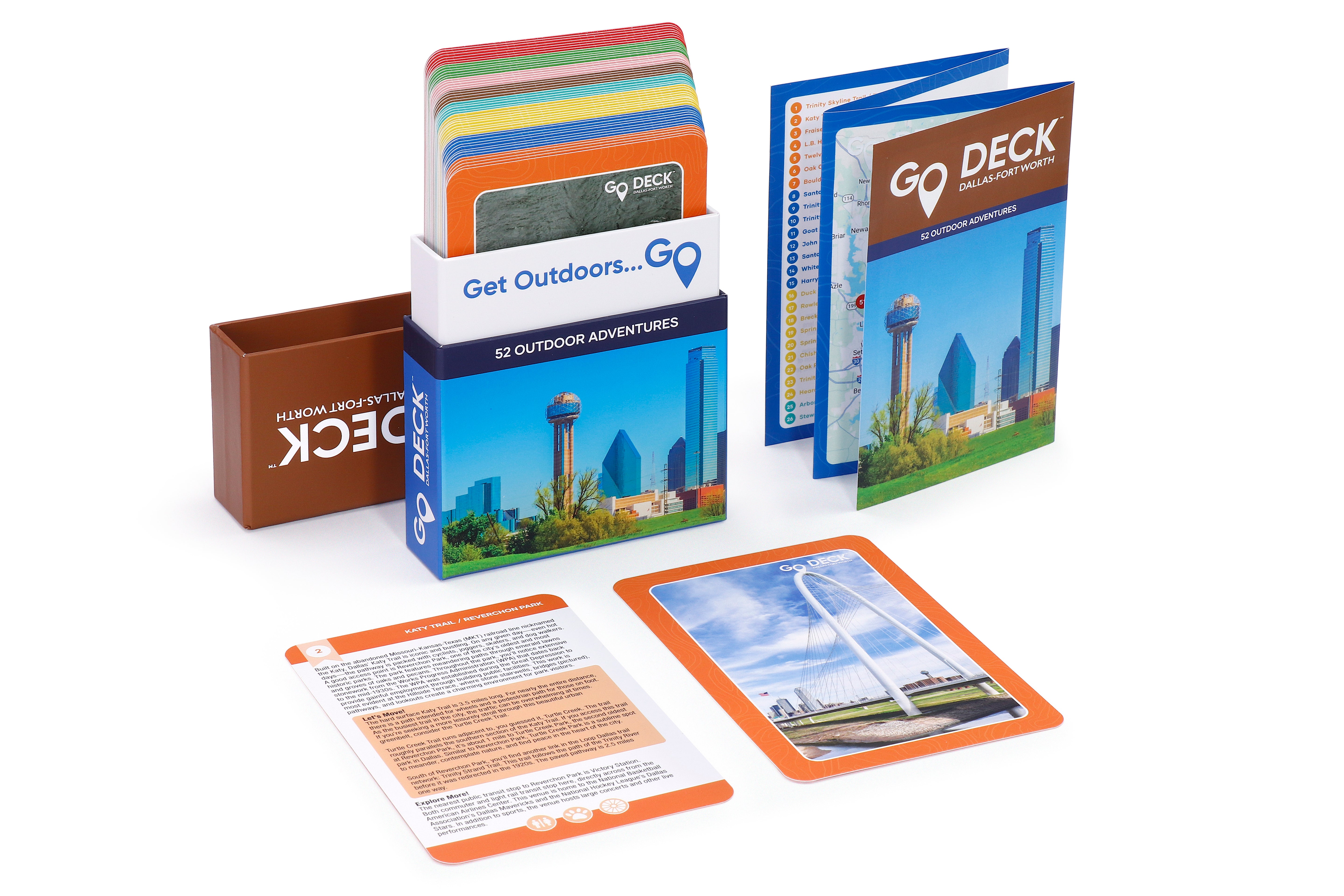 Outdoor adventure card deck packaging with cards and guidebook on a white background